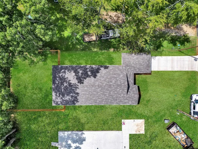 an aerial view of a house with garden
