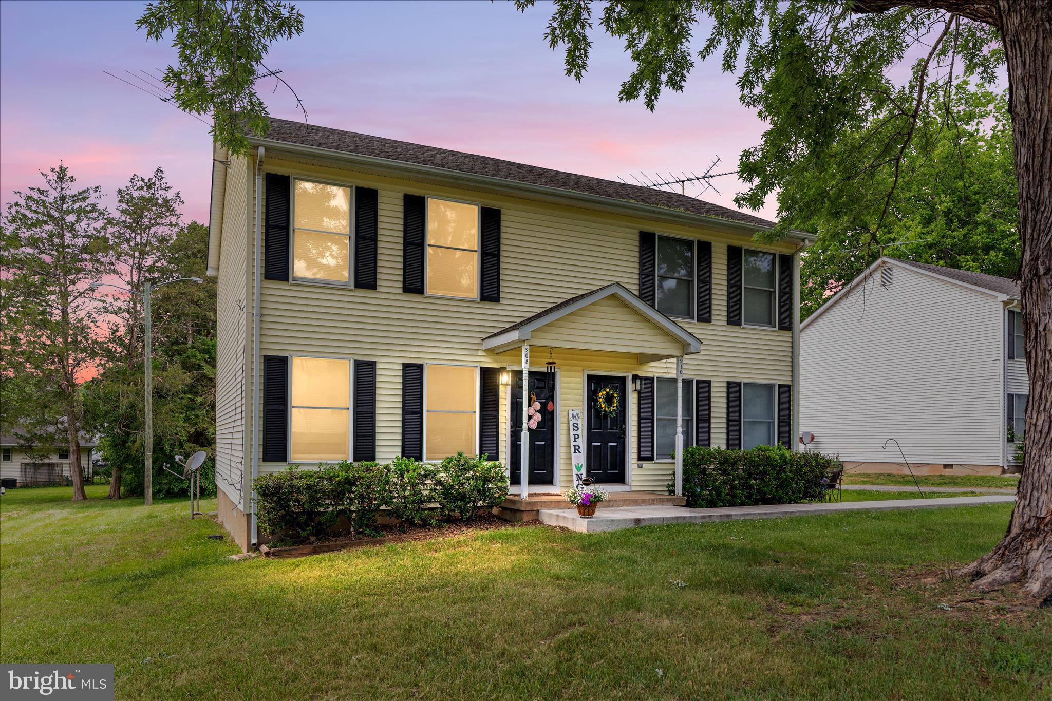 208 North Rappahannock Street Remington, VA 22734 - Photo 1 of 21 a front view of a house with a yard