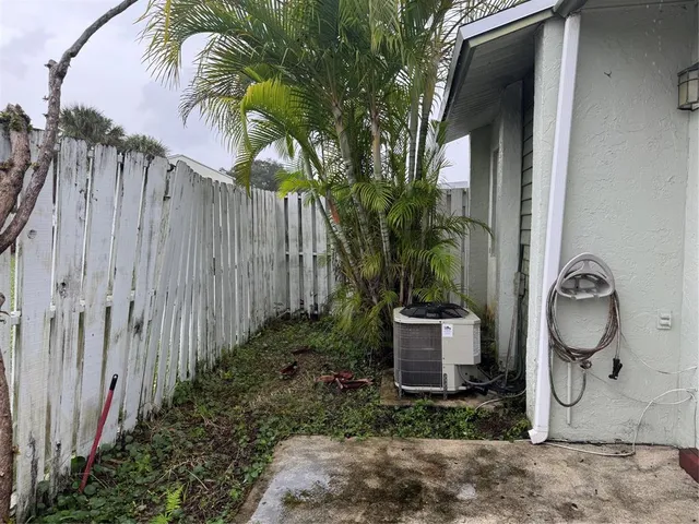 a view of a garden with a lake