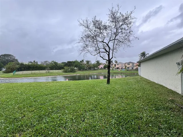 a view of a backyard with a garden