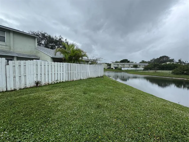 a view of a lake with a city view