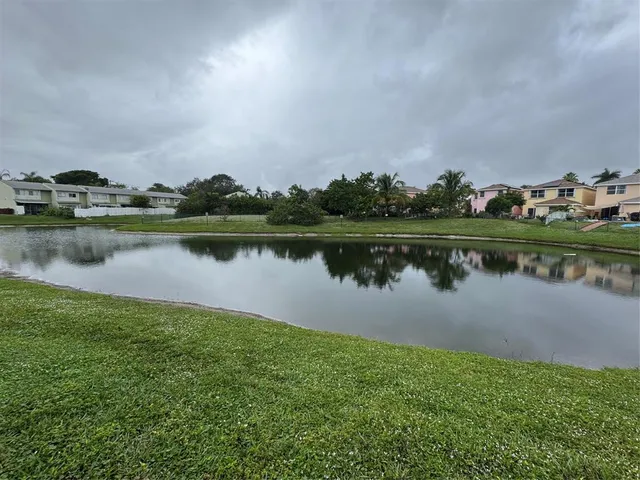 a view of a lake with a outdoor space