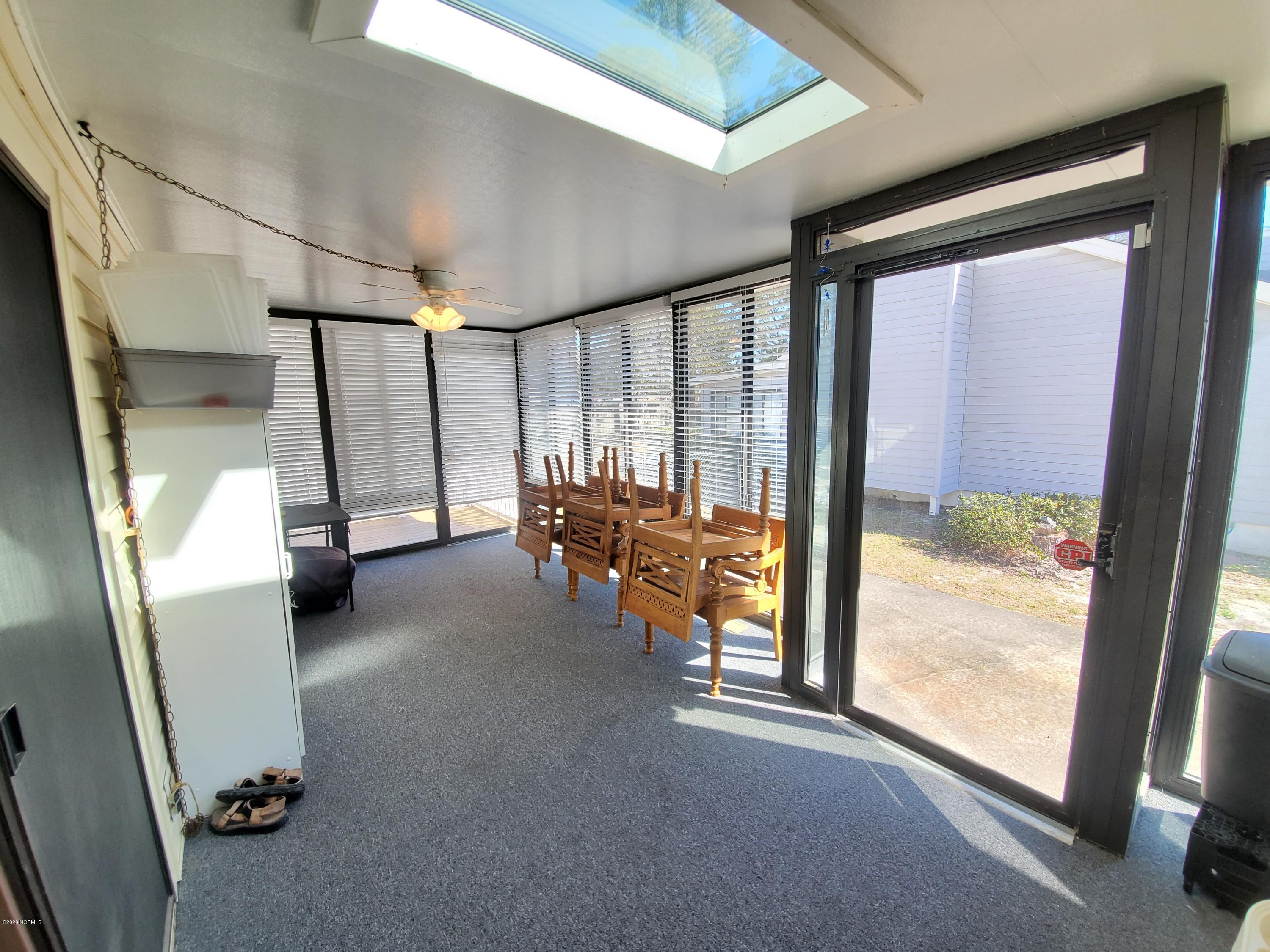 6090 Culpepper Road Southwest Ocean Isle Beach, NC 28469 - Photo 15 of 32 Sunroom
