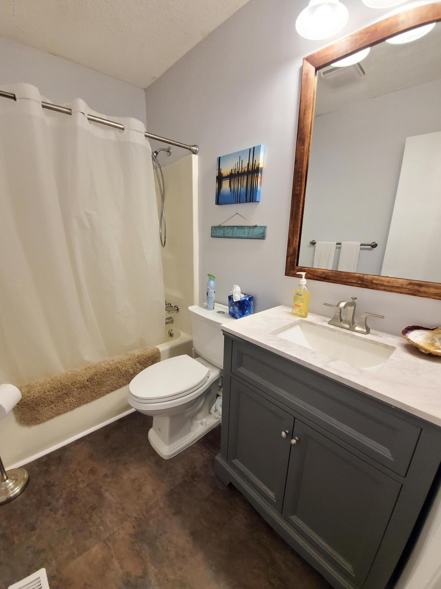 6090 Culpepper Road Southwest Ocean Isle Beach, NC 28469 - Photo 18 of 32 Spare Bathroom
