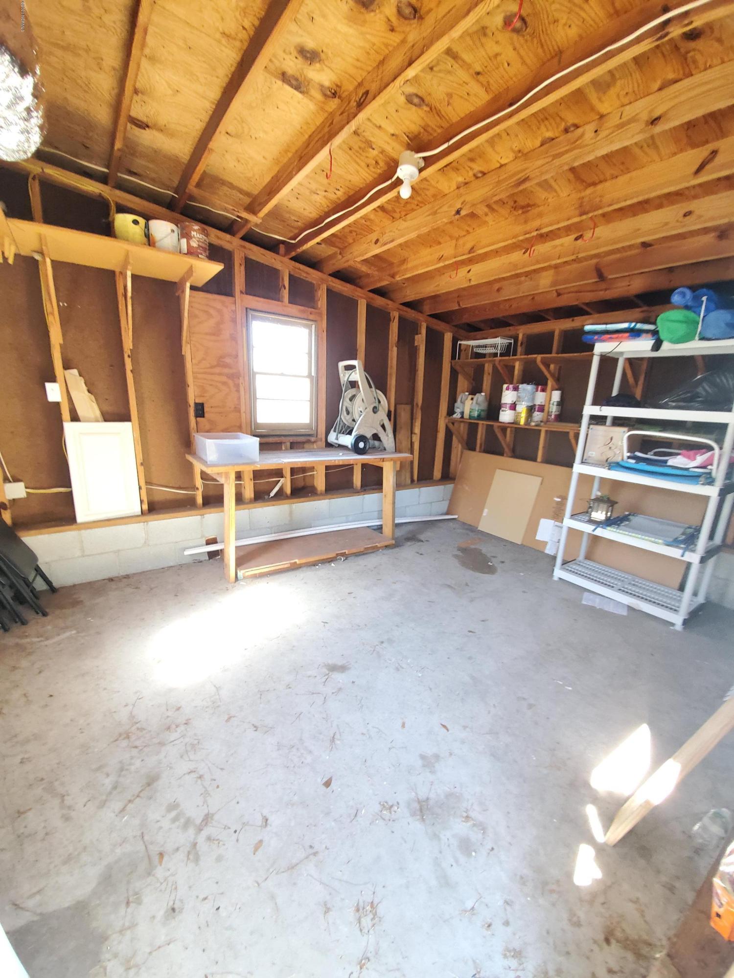 6090 Culpepper Road Southwest Ocean Isle Beach, NC 28469 - Photo 31 of 32 Storage Shed