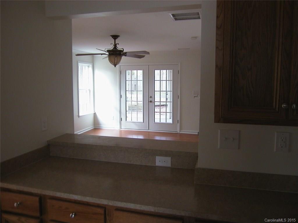 6729 Bevington Ridge Road, Unit A Charlotte, NC 28277 - Photo 6 of 12 a view of an empty room with a window