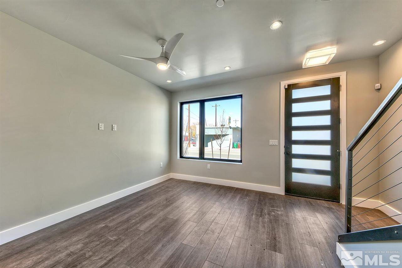 504 Mill Street Reno, NV 89502 - Photo 12 of 22 wooden floor in an empty room with a window