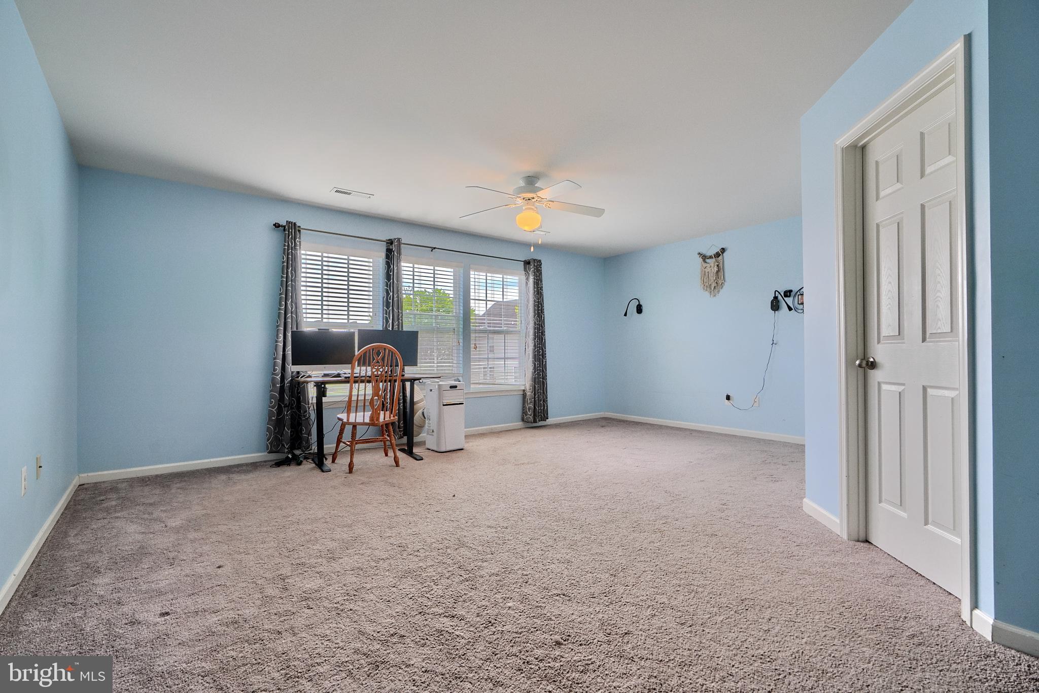 709 Middle River Road Middle River, MD 21220 - Photo 19 of 50 a view of workspace with furniture and a window