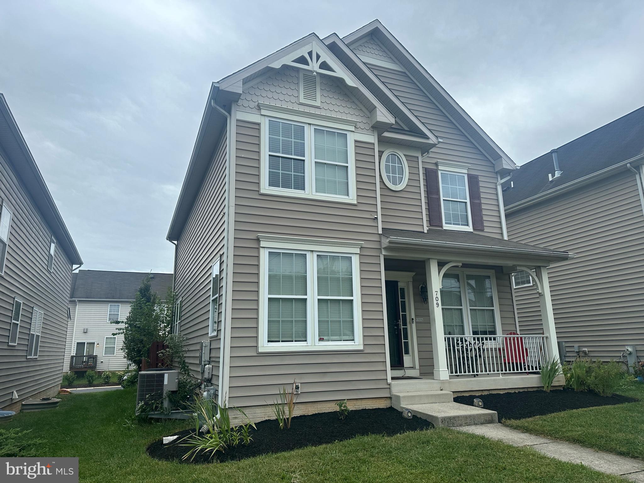 709 Middle River Road Middle River, MD 21220 - Photo 2 of 50 a front view of a house with a yard