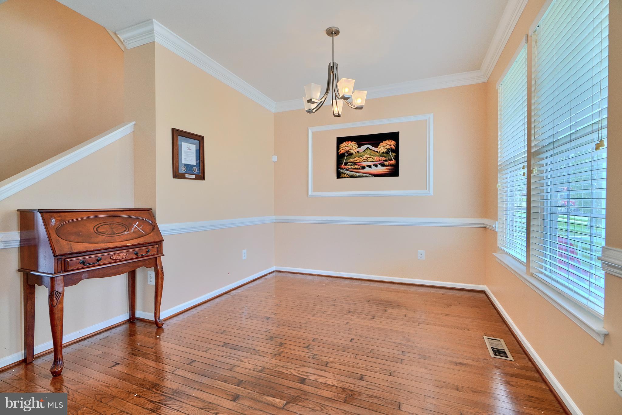 709 Middle River Road Middle River, MD 21220 - Photo 8 of 50 a view of a room with wooden floor and window