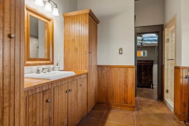 a bed room with a bed and a couch