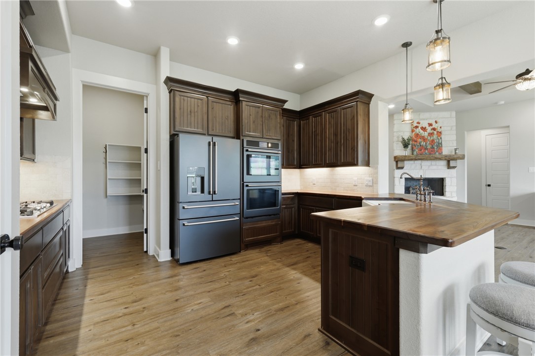 10405 Lone Star Road Washington, TX 77880 - Photo 9 of 25 walnut countertops and double ovens