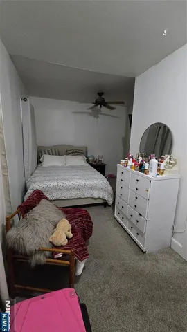 a kitchen with a stove a sink and a refrigerator