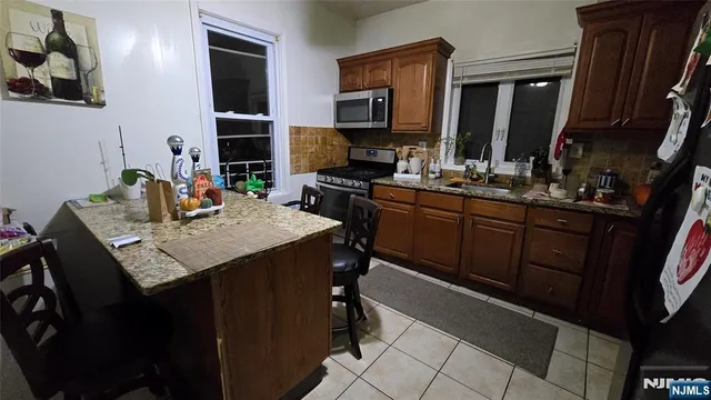 a view of a room with rack and white walls