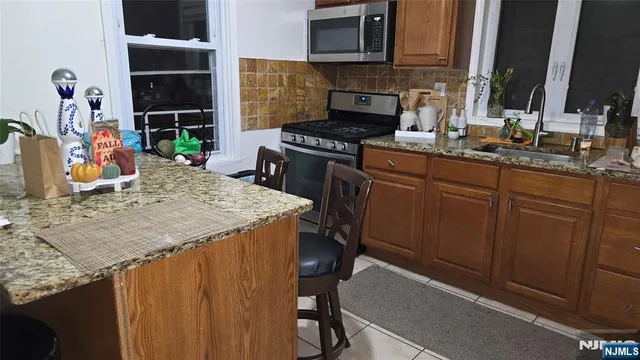 a hallway with a view of living room