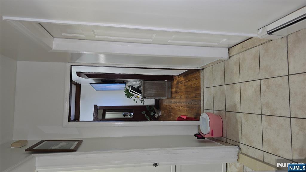 106 Knapp Avenue Clifton, NJ 07011 - Photo 7 of 7 a hallway with a view of living room