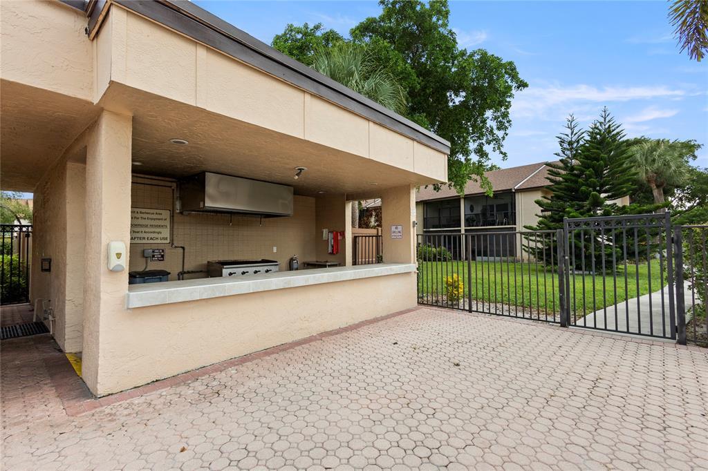 2209 Southwest 15th Street, Unit 241 Deerfield Beach, FL 33442 - Photo 45 of 46 outdoor kitchen
