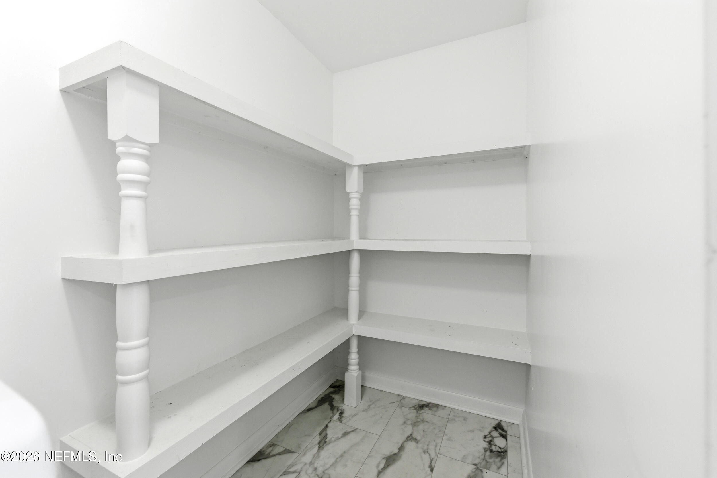 7484 Spinola Road Jacksonville, FL 32217 - Photo 26 of 63 a view of an empty walk in closet