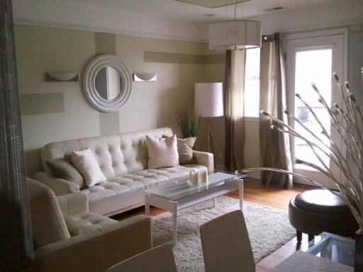 6954 North Greenview Avenue, Unit 305 Chicago, IL 60626 - Photo 9 of 12 a living room with furniture and a large window