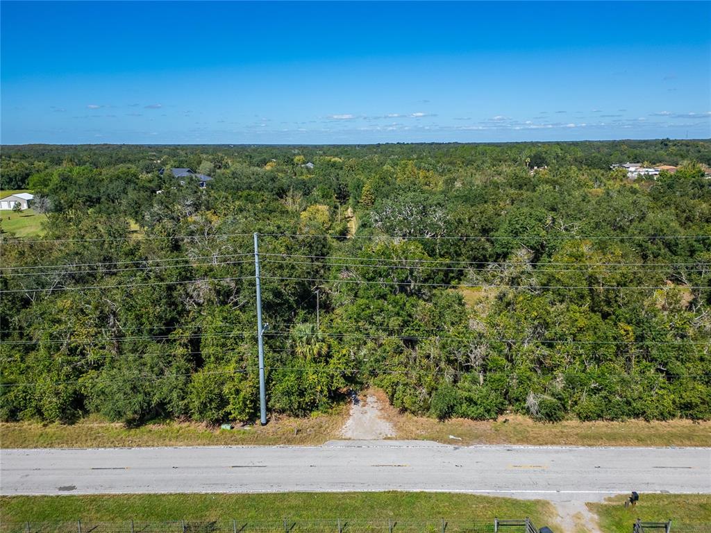 6930 Muck Pond Road Seffner, FL 33584 - Photo 13 of 37 view of an outdoor space and a yard