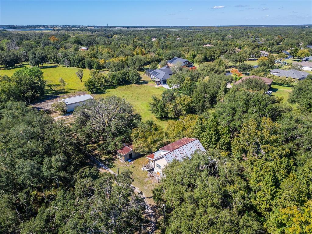 6930 Muck Pond Road Seffner, FL 33584 - Photo 26 of 37 an aerial view of a house with a yard