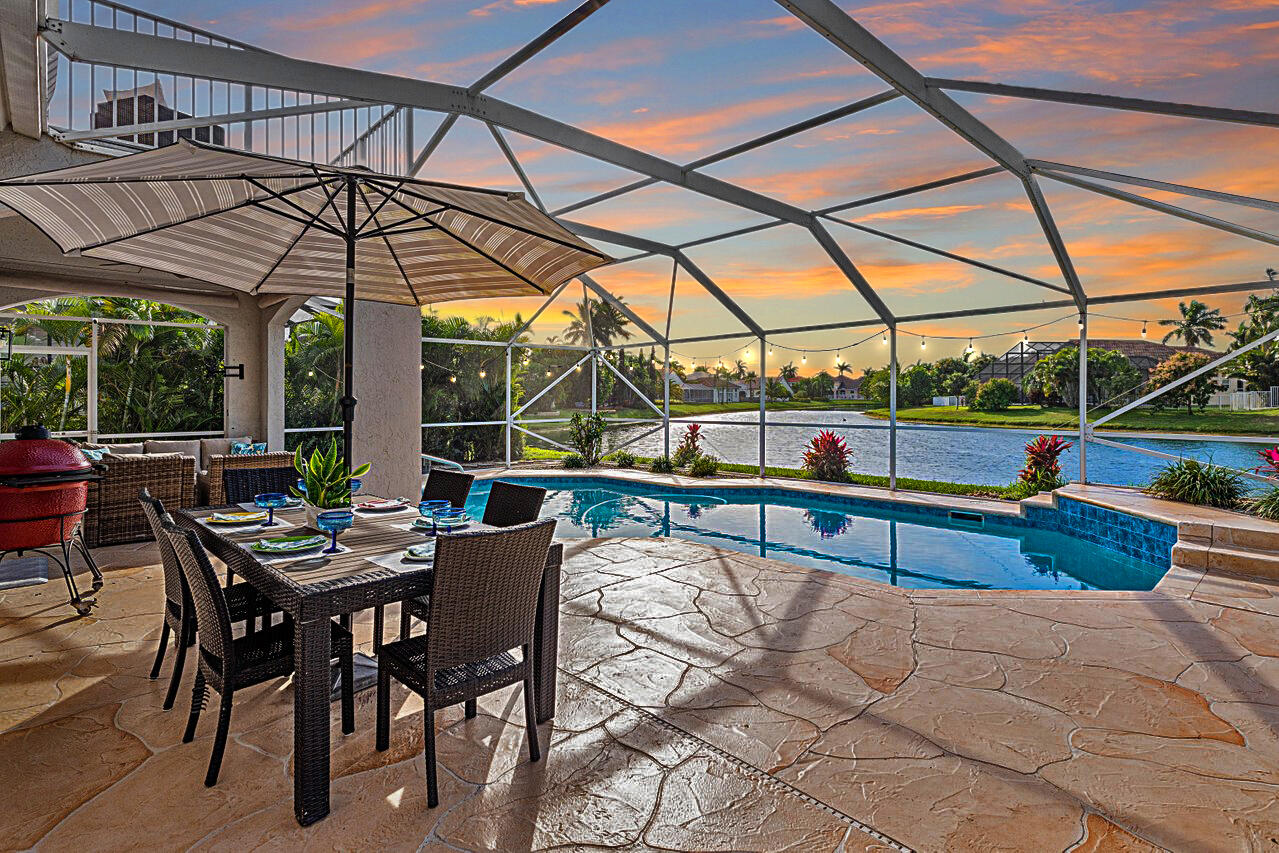 10672 St Thomas Drive Boca Raton, FL 33498 - Photo 1 of 45 Twilight Pool Picture