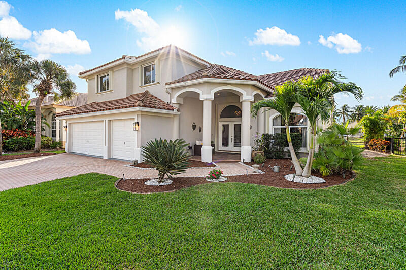 10672 St Thomas Drive Boca Raton, FL 33498 - Photo 2 of 45 Front of Home