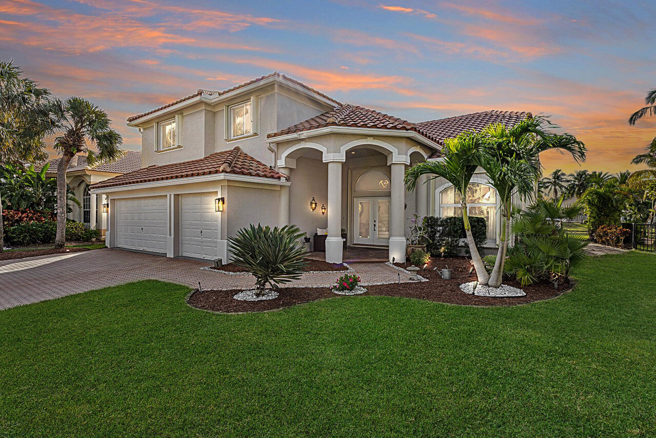 10672 St Thomas Drive Boca Raton, FL 33498 - Photo 3 of 45 Twilight Front of home