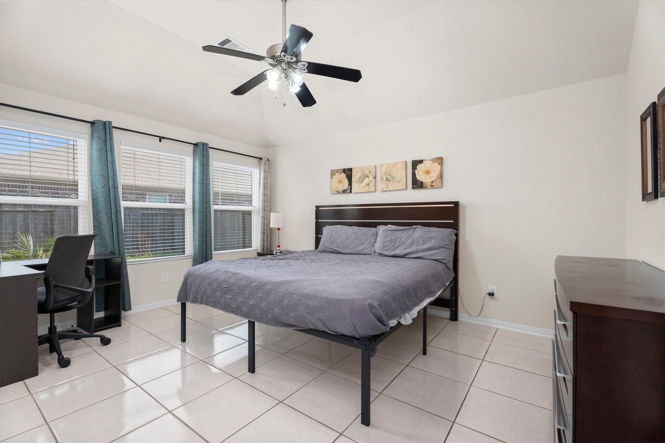 2615 Magnolia Fair Way Spring, TX 77386 - Photo 12 of 22 a bedroom with a bed and glass door