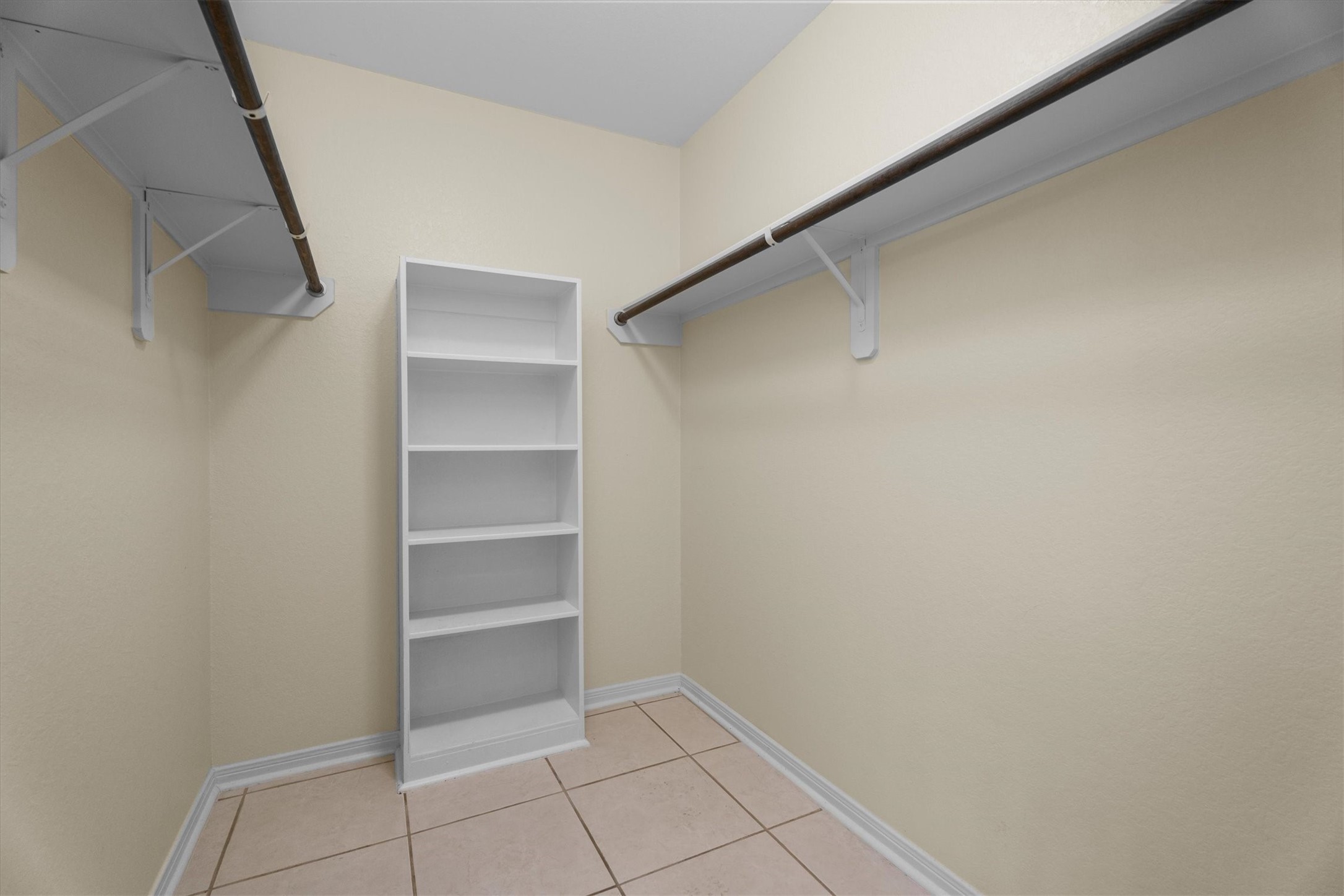 2615 Magnolia Fair Way Spring, TX 77386 - Photo 15 of 22 a view of an empty walk in closet