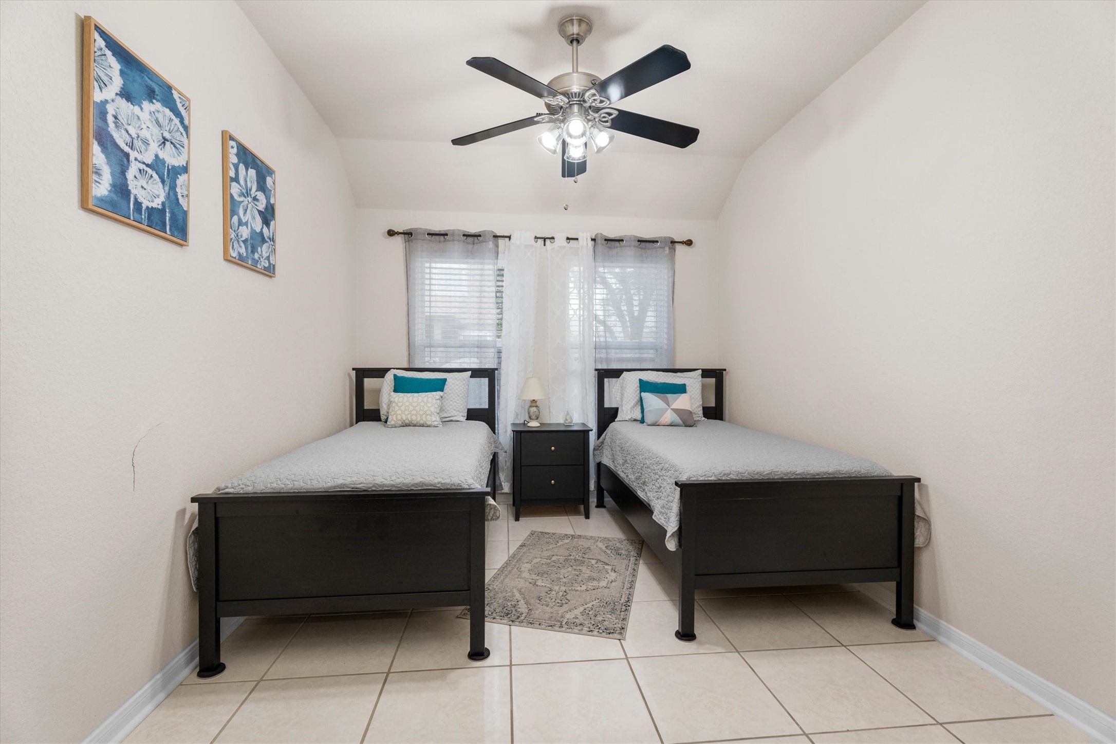 2615 Magnolia Fair Way Spring, TX 77386 - Photo 16 of 22 a bedroom with a bed and a table
