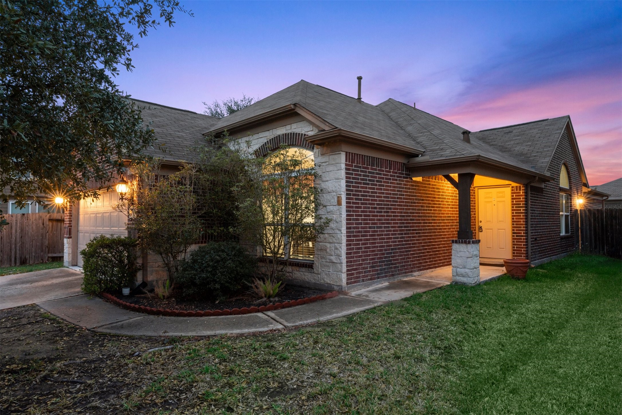 2615 Magnolia Fair Way Spring, TX 77386 - Photo 2 of 22 a front view of a house with garden