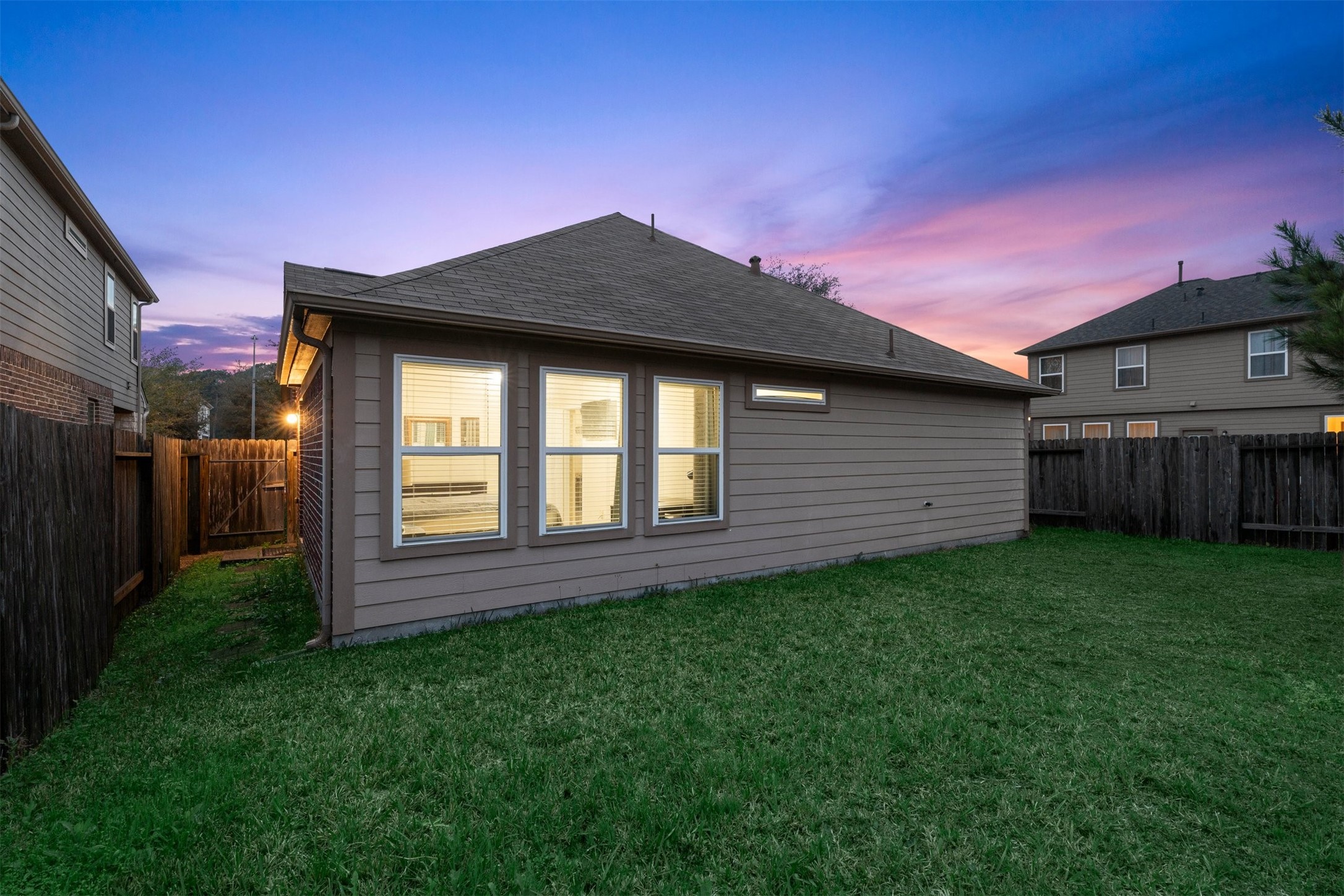 2615 Magnolia Fair Way Spring, TX 77386 - Photo 21 of 22 a front view of a house with a garden