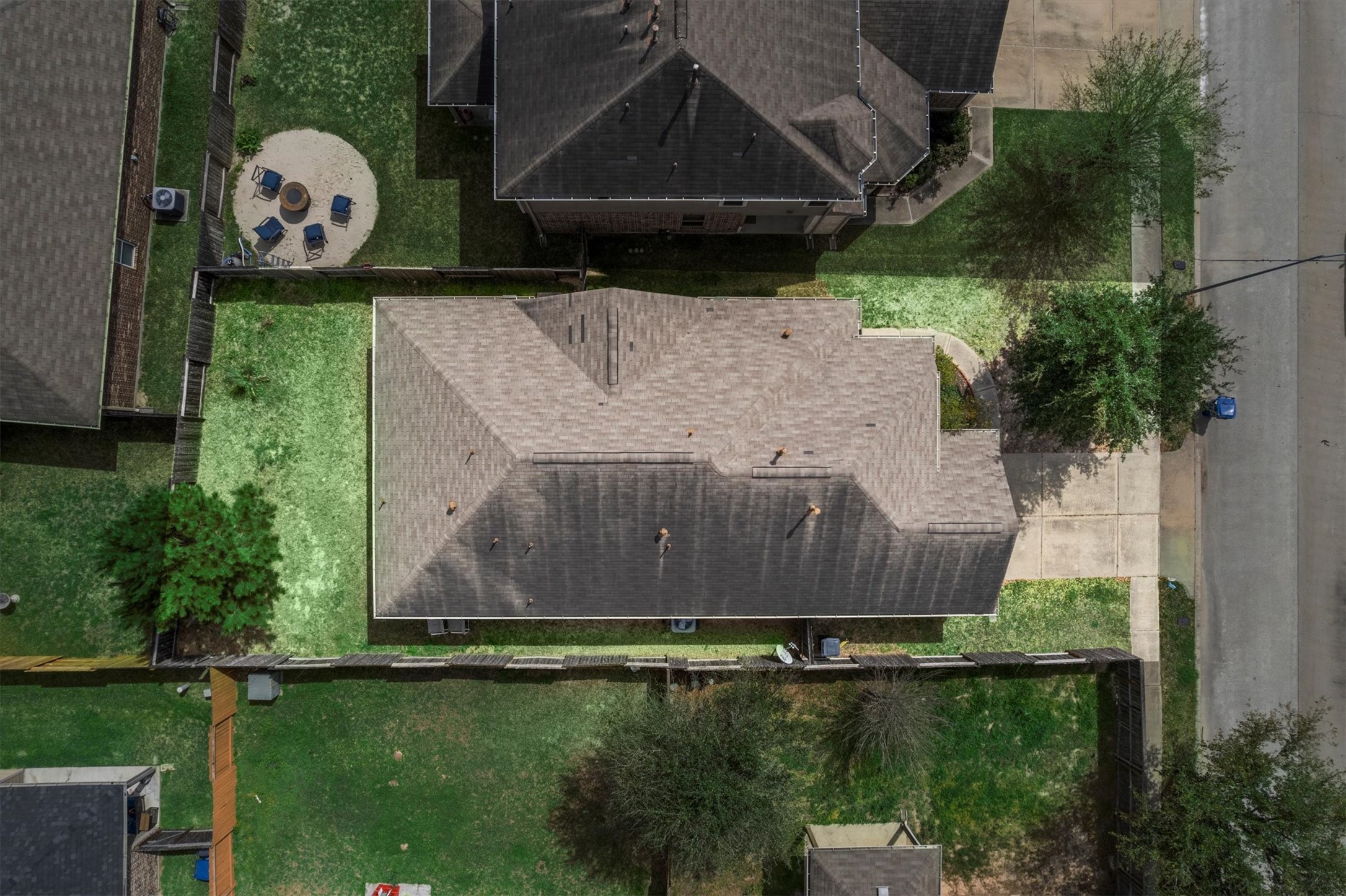 2615 Magnolia Fair Way Spring, TX 77386 - Photo 22 of 22 a view of a backyard with water fountain and large trees