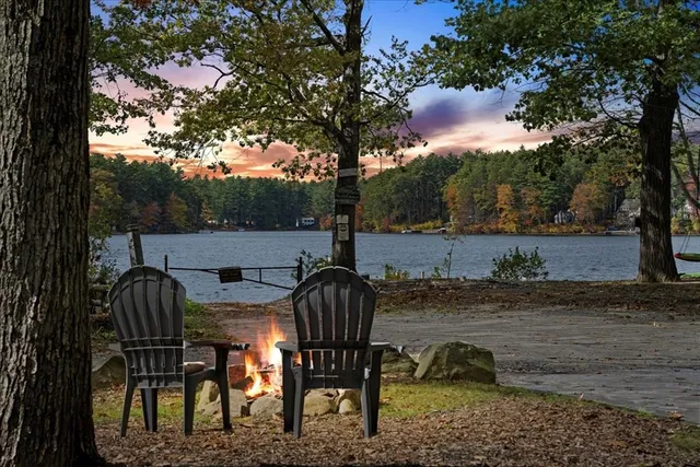 a view of a chairs and table in patio