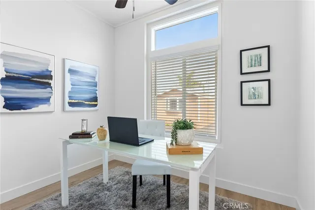 a workspace with furniture and window