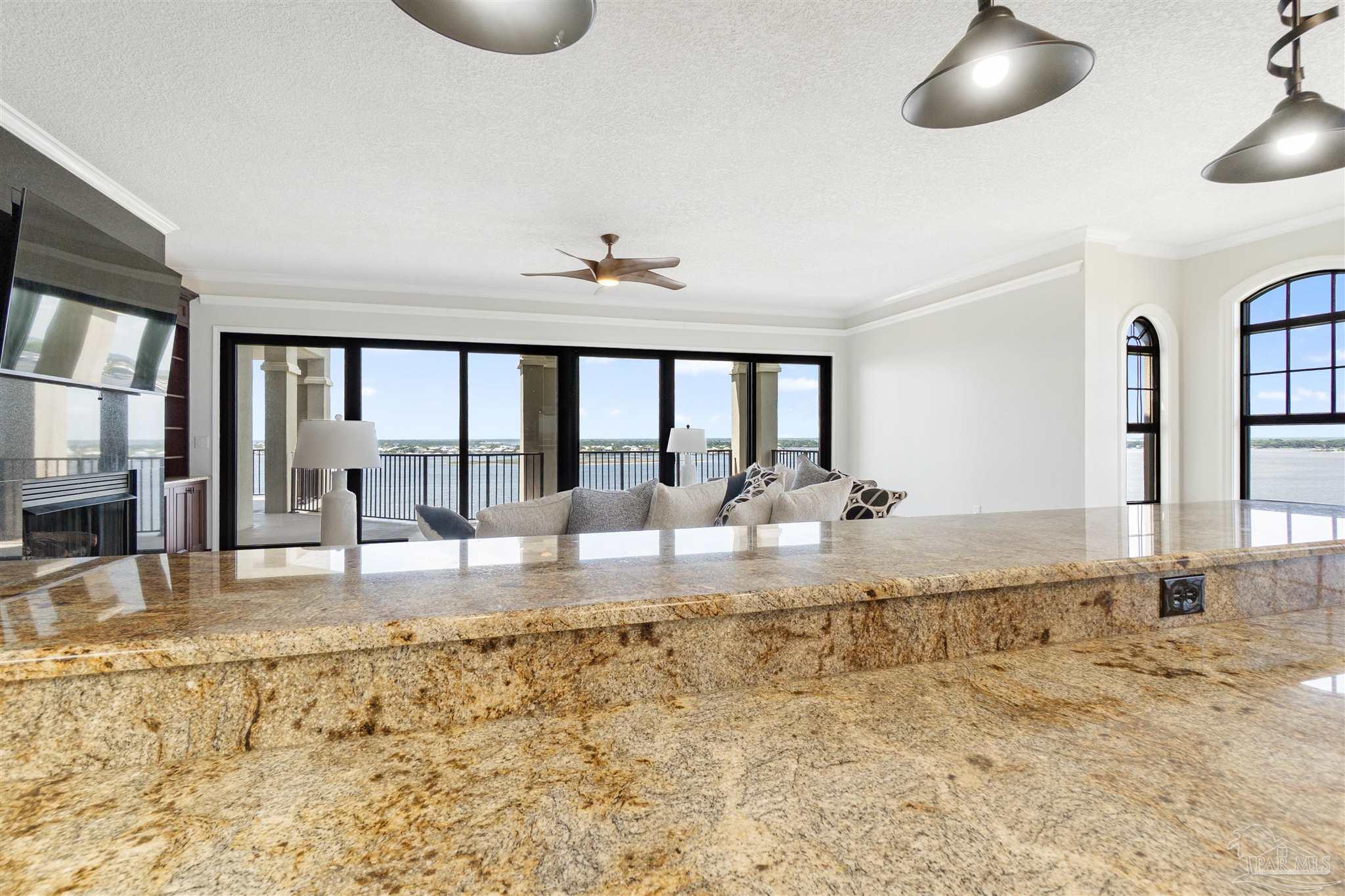 14900 River Road, Unit 904 Pensacola, FL 32507 - Photo 11 of 17 a large white kitchen with a large window