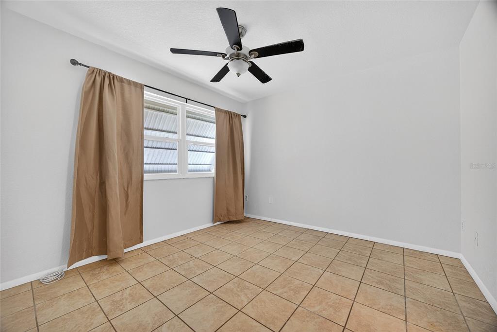 2136 Barksdale Street Port Charlotte, FL 33948 - Photo 19 of 33 a view of an empty room