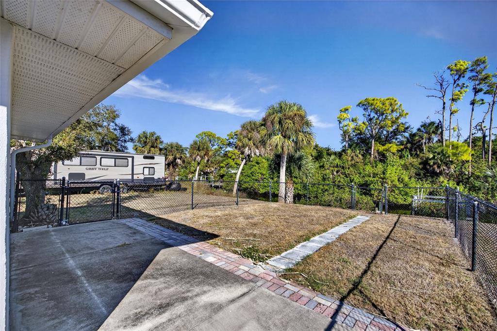 2136 Barksdale Street Port Charlotte, FL 33948 - Photo 22 of 33 a view of a backyard