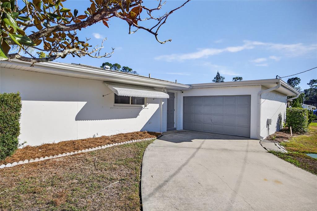 2136 Barksdale Street Port Charlotte, FL 33948 - Photo 31 of 33 a view of a house with a snow in the background