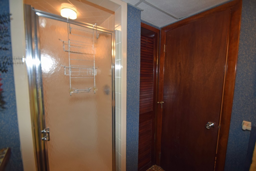 7 Van Beal Road Randolph, MA 02368 - Photo 18 of 22 a bathroom with a shower and a glass door