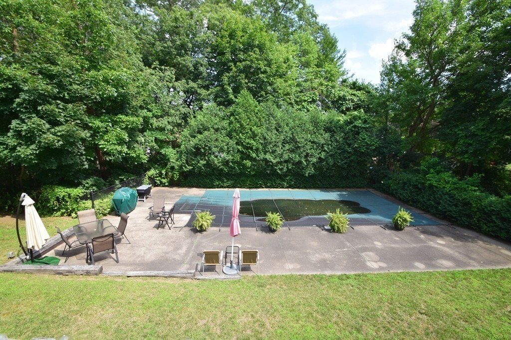 7 Van Beal Road Randolph, MA 02368 - Photo 21 of 22 a view of a chairs and table in the garden