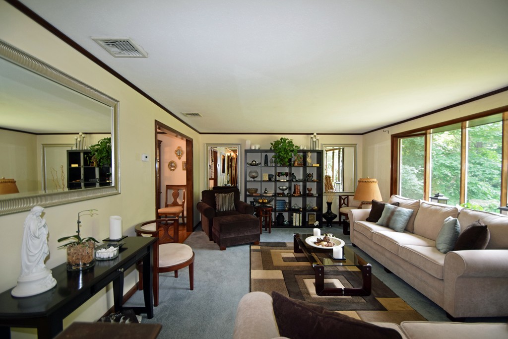 7 Van Beal Road Randolph, MA 02368 - Photo 3 of 22 a living room with furniture and a large window