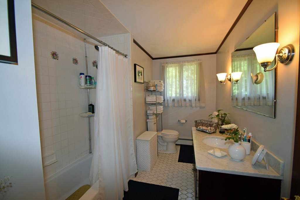 7 Van Beal Road Randolph, MA 02368 - Photo 7 of 22 a bathroom with a sink toilet and shower