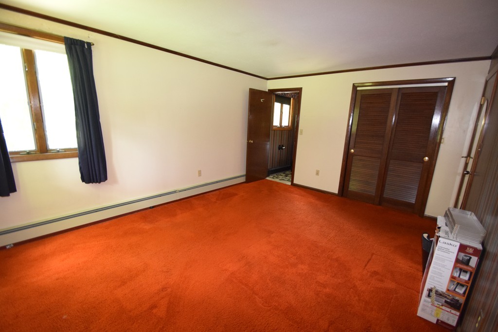 7 Van Beal Road Randolph, MA 02368 - Photo 8 of 22 a view of an empty room with a window