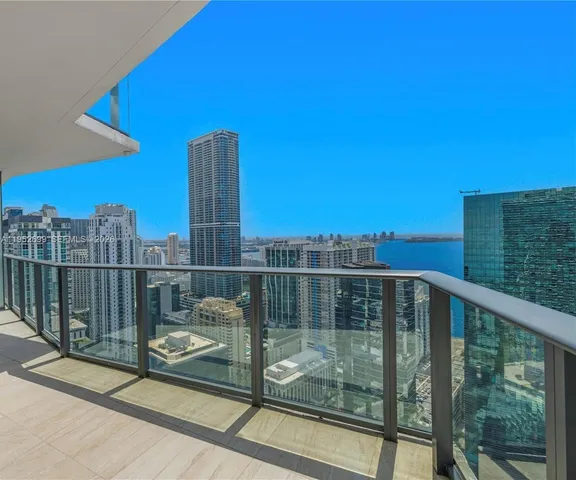 a balcony with view of city from a balcony