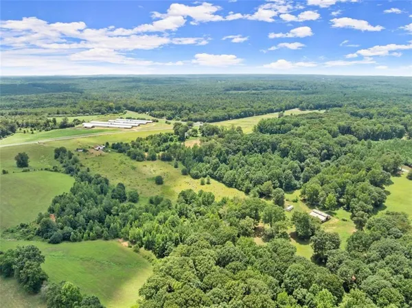 a view of a lake with a yard