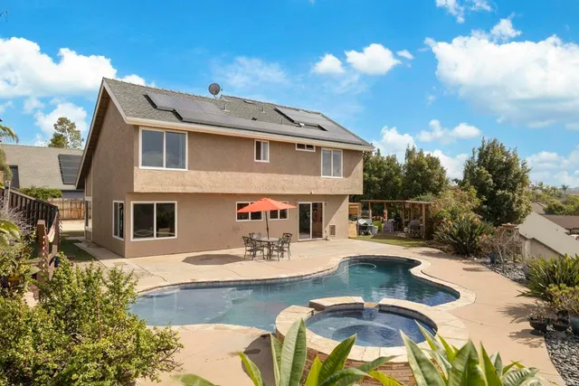 a bathroom with a sink mirror toilet and bathtub
