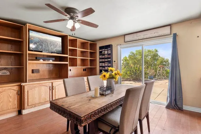 a bedroom with bed and a chandelier
