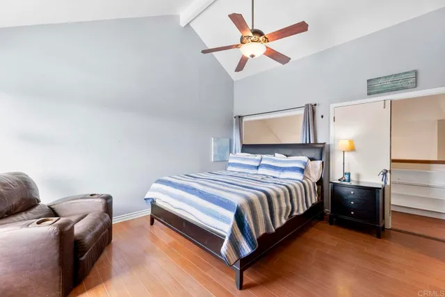 a en suite bathroom with a sink a mirror and shower